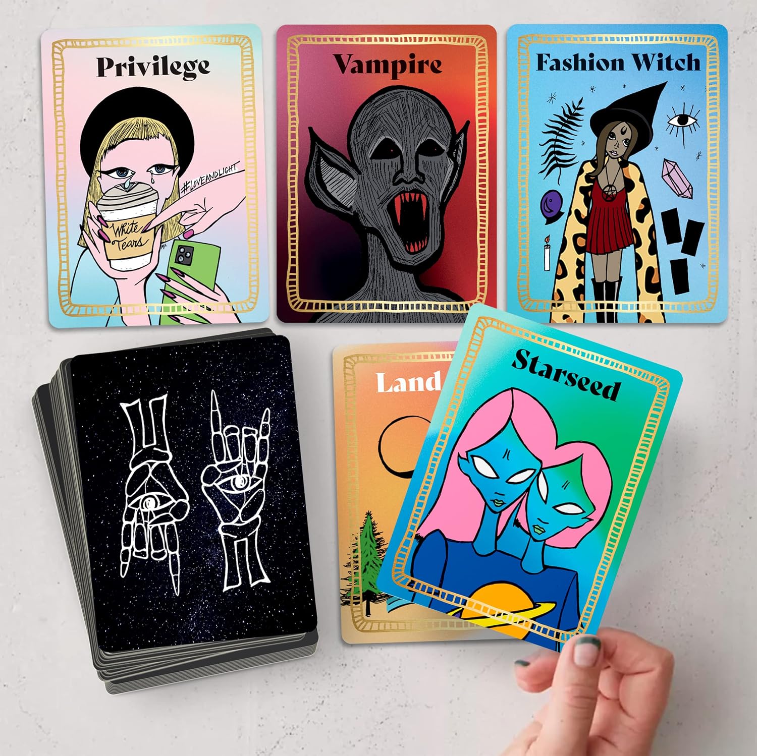 Set of colorful tarot cards with various illustrations on a light gray background.
