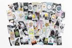 Collection of tarot cards with various designs on a white background