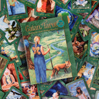 Gaian Tarot cards with a central card featuring a woman and fox, surrounded by other tarot cards.