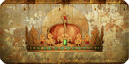 Decorative crown with gold and red accents on a textured background