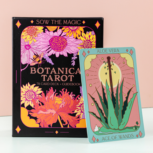 Botanica Tarot book and a tarot card featuring an aloe vera plant on a light pink background.
