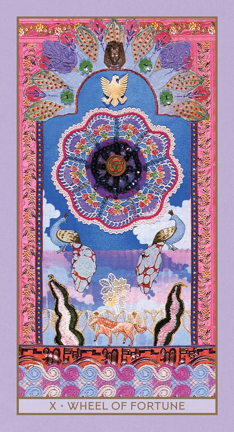 Colorful tarot card featuring the 'Wheel of Fortune' with intricate designs and symbols.