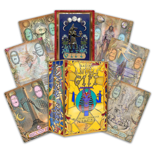 A set of illustrated tarot cards and a matching box arranged on a plain white background. The central box is bright yellow with a blue and gold Egyptian-themed design reading 'Mystery of the Ancients Card Game'.