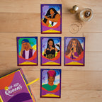 Set of colorful trading cards featuring women on a wooden surface with a box labeled 'Hip-Hop Queens'.