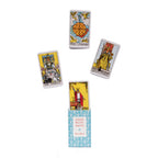 Four tarot cards from the Rider-Waite Smith deck with the deck box in the center on a white background.
