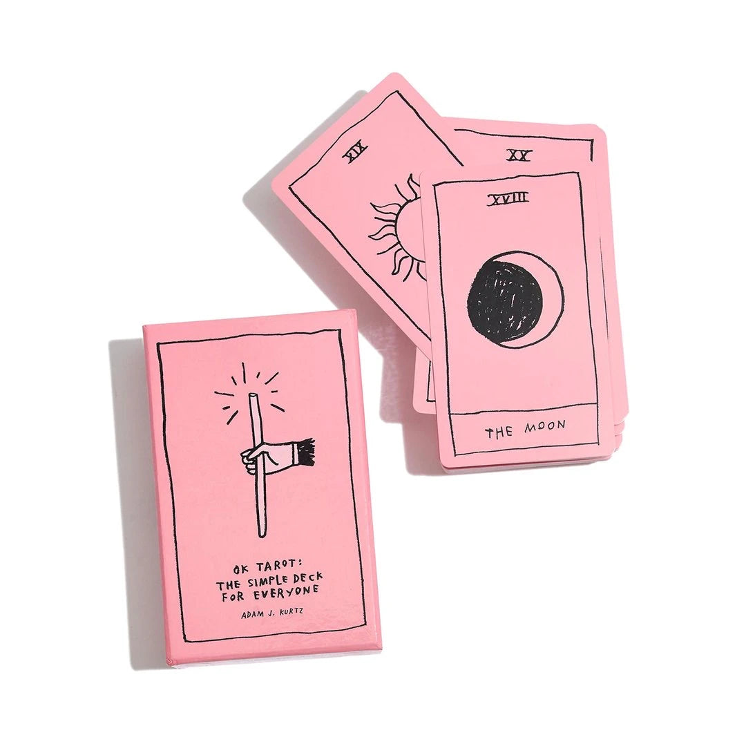 Pink tarot cards with black illustrations on a white background