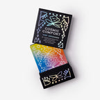 Colorful card deck with 'Cosmic Comfort' packaging on a white background