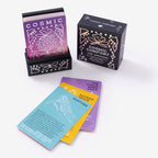 Card decks with 'Cosmic Comfort' branding on a white background