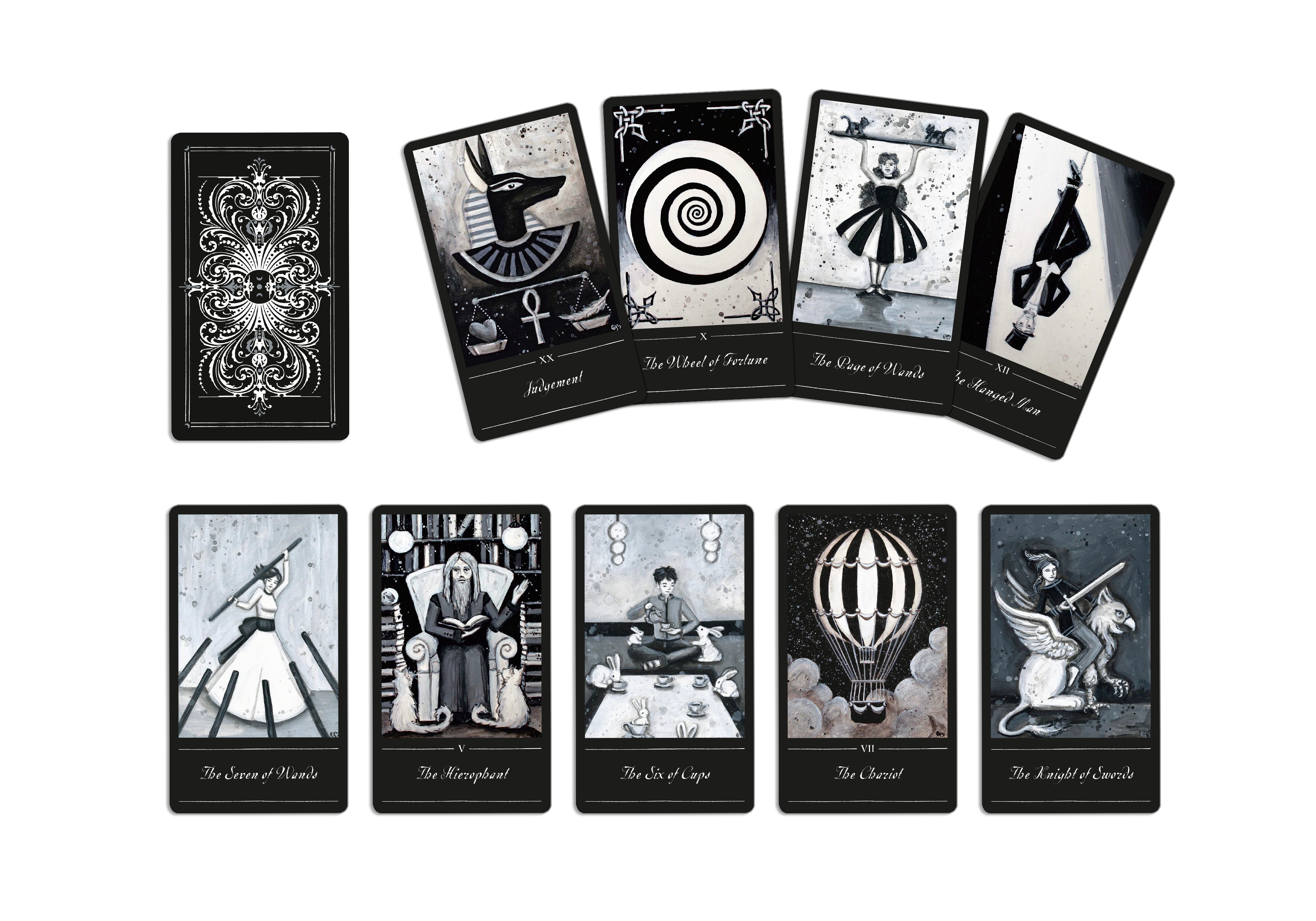 Set of tarot cards with black and white designs on a white background