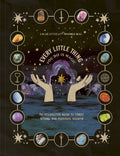 Book cover with hands holding a rainbow, celestial symbols, and text about tarot and personal growth.