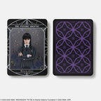 Card featuring a character with a gothic style and intricate design on a white background