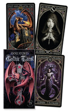 Four tarot cards from Anne Stokes Gothic Tarot set with dark and mystical designs.