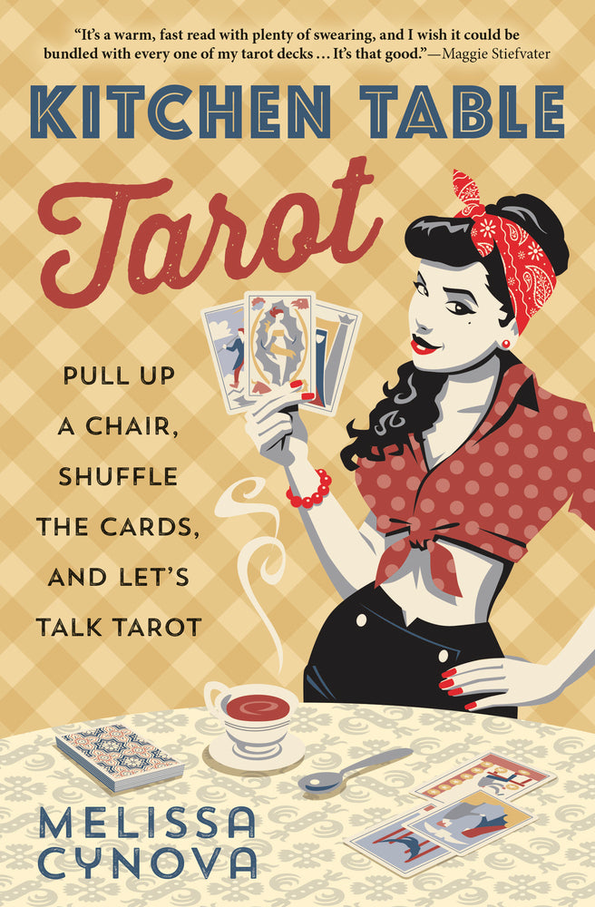 Book cover of 'Kitchen Table Tarot' with a woman holding tarot cards at a table.