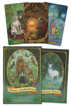 Four tarot cards featuring forest animals and nature-themed artwork.