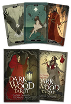 Dark Wood Tarot cards with artistic illustrations and the tarot set cover.
