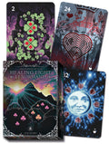 Four tarot cards with colorful designs and text on a dark background