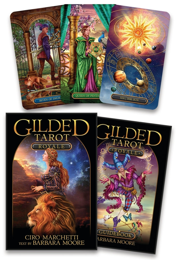 Gilded Tarot Royale deck and guidebook with sample cards featuring ornate, colorful artwork
