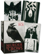 Collection of tarot cards with black and white illustrations and 'Murder of Crows Tarot' packaging.