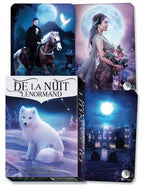 Collection of tarot card boxes with fantasy-themed designs featuring a man on a horse, a woman with flowers, a white arctic fox, and a castle under a moonlit sky.