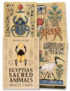 Oracle cards with Egyptian sacred animals design on a beige background