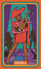 Card featuring a woman in a red hat and coat holding a trophy, with 'The Ball' text at the bottom.