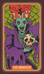 Cartoon character with red hair and green skin holding a skull, labeled 'The Monster', on a spider web background.