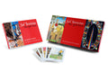 Sol Invictus tarot cards with red cover and colorful illustrations on a white background