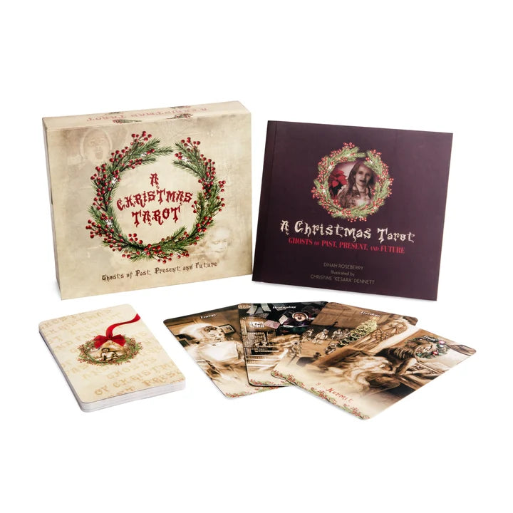 A Christmas Tarot card set with tarot cards and packaging on a white background