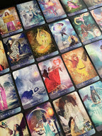 Collection of colorful tarot cards with various designs and characters.