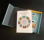 Time Changer's Tarot book with tarot cards in a box on a dark background