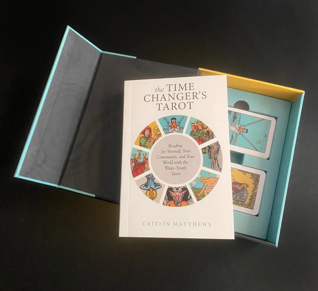 Time Changer's Tarot book with tarot cards in a box on a dark background