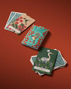 Set of cards with bird illustrations on a red background