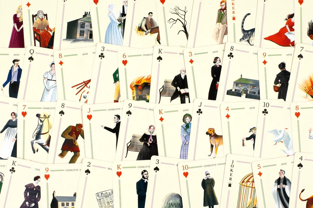 Playing cards with illustrated characters and scenes on a white background