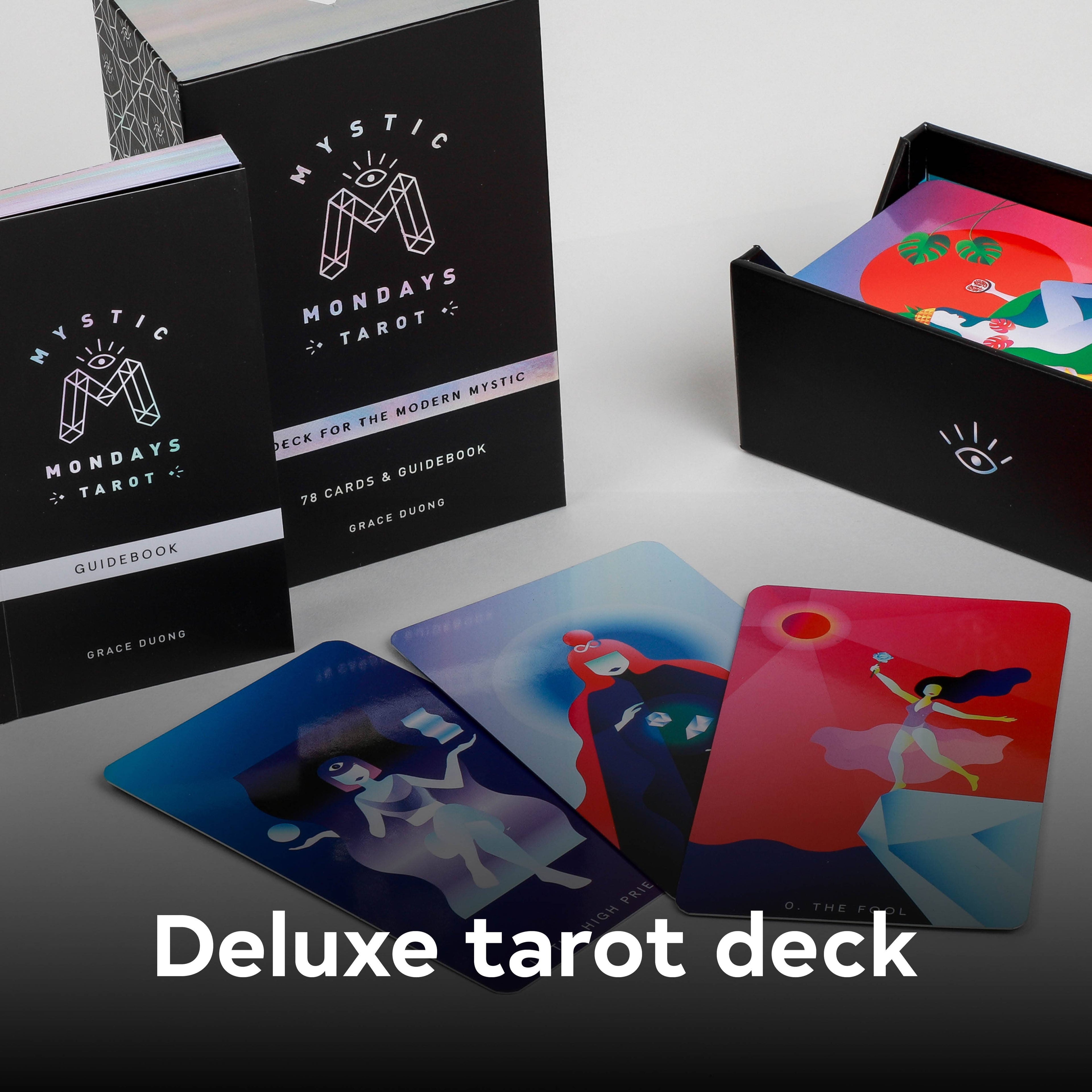 Deluxe tarot deck with cards and packaging on a white background