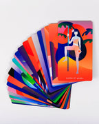 Colorful tarot cards with a Queen of Wands card on a white background