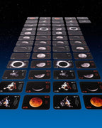 Collection of space-themed playing cards on a dark background