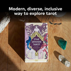 Star Spinner Tarot box on a wooden surface with crystals around