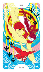 Colorful tarot card featuring a woman in a red dress with a bird, against a vibrant background.