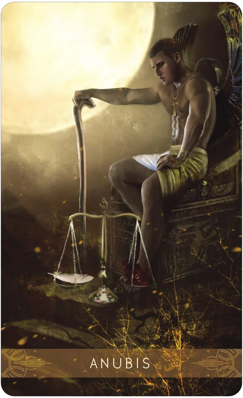 Tarot card featuring Anubis with scales and moon in background