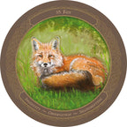 Round coaster with a fox illustration and decorative border on a white background