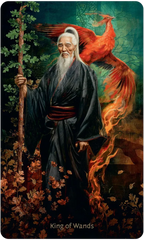 Card featuring an elderly man in a dark robe with a phoenix and wand, labeled 'King of Wands'.