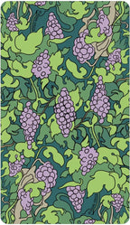Notebook with a decorative cover featuring green leaves and purple grapes on a teal background