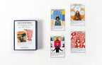 Set of tarot cards with colorful designs and a guidebook on a white background