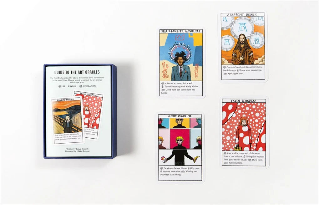 Set of tarot cards with colorful designs and a guidebook on a white background