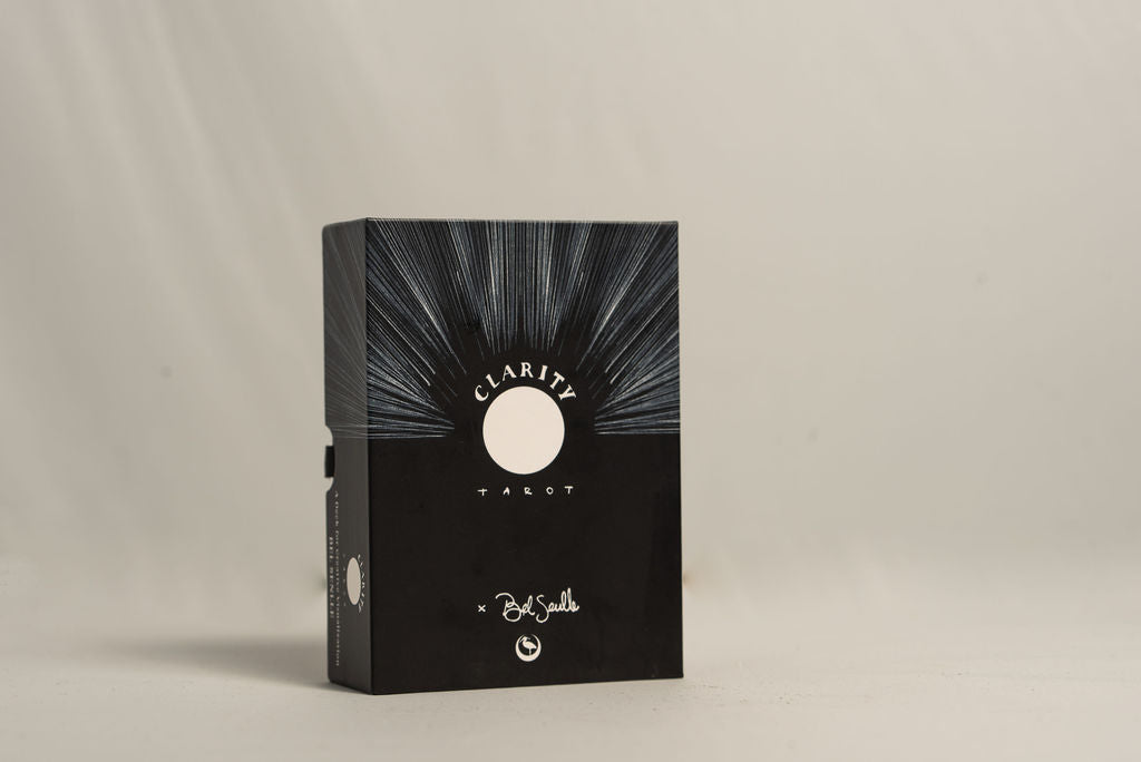 Black tarot card box with 'Clarity Tarot' text on a beige background