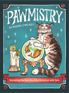 Book cover of 'Pawmistry' featuring a cat with a crystal ball and candles on a teal background.
