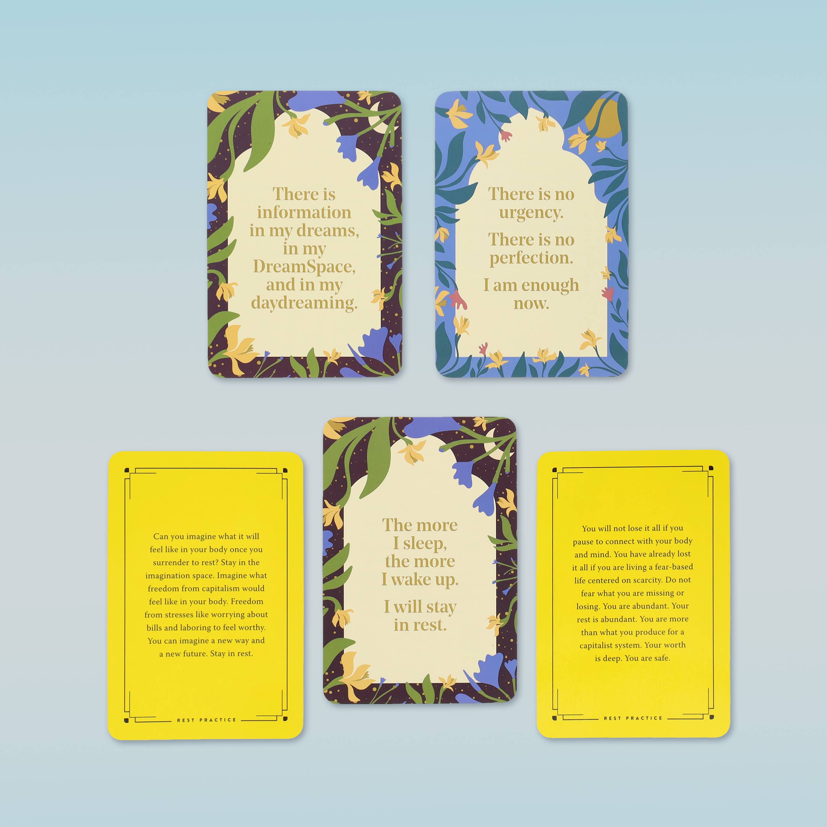 Set of four cards with motivational phrases on a light blue background