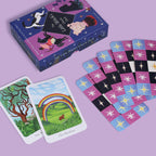 Oracle deck with cards and box on a purple background