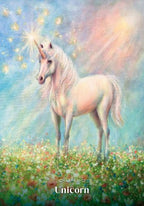 A pastel fantasy painting of a white unicorn standing in a flower field, with a glowing sunburst and rainbow light behind it. The word 'Unicorn' appears at the bottom.