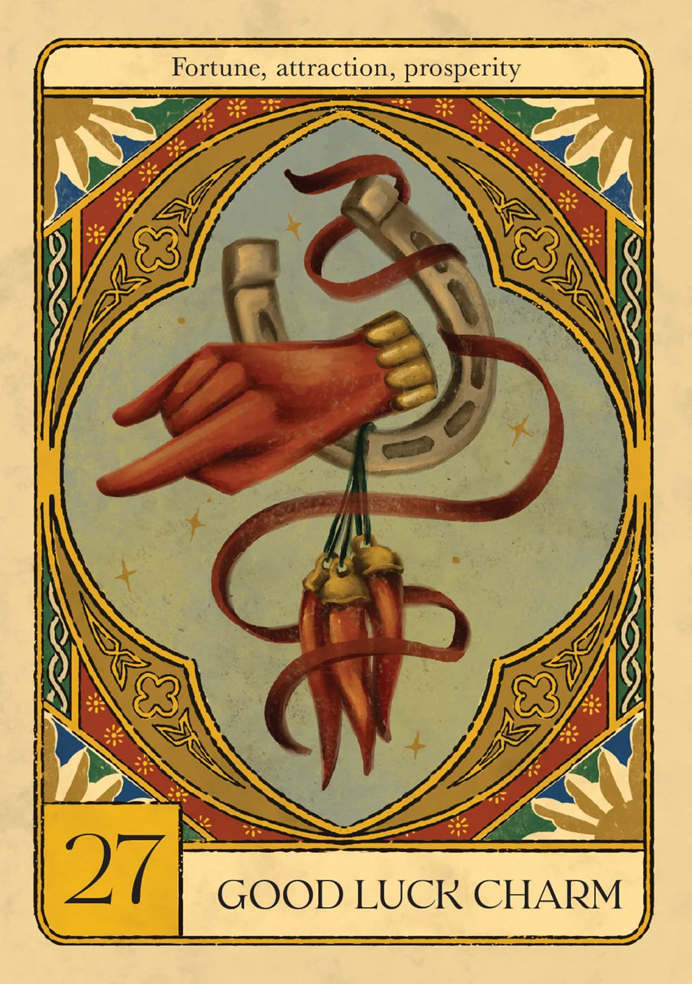 A vintage-style lucky charm card labeled '27 GOOD LUCK CHARM' with the phrase 'Fortune, attraction, prosperity' at the top. The illustration shows a red hand holding a silver horseshoe and a bundle of red chili peppers, surrounded by ornate gold, red, and blue decorative borders on a beige background.
